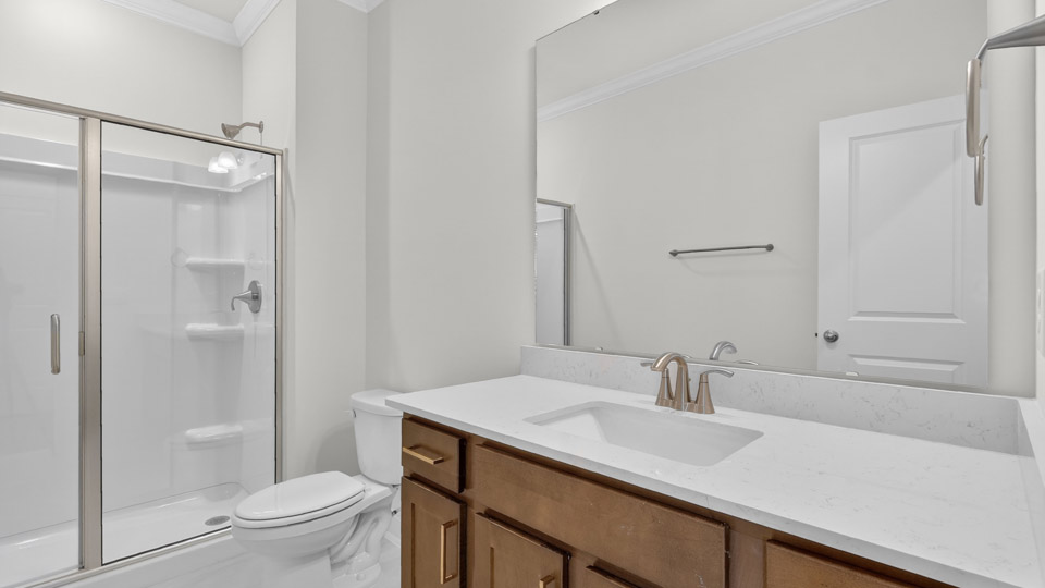 Bathroom with sink and walk in shower