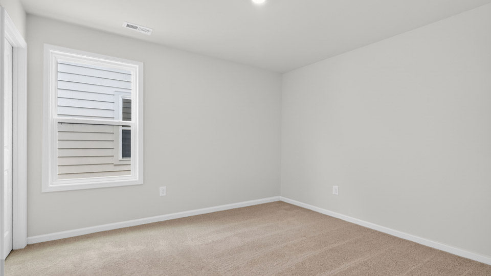 Bedroom with carpet floor and closet