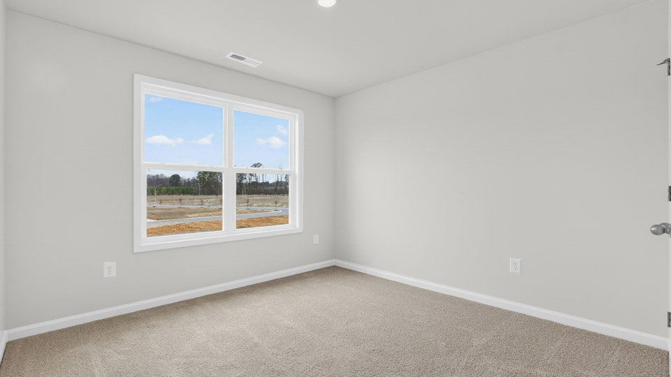 Bedroom with carpet floor and closet
