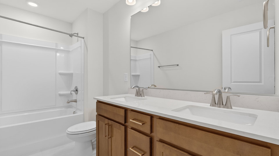 Bathroom with sink and tub