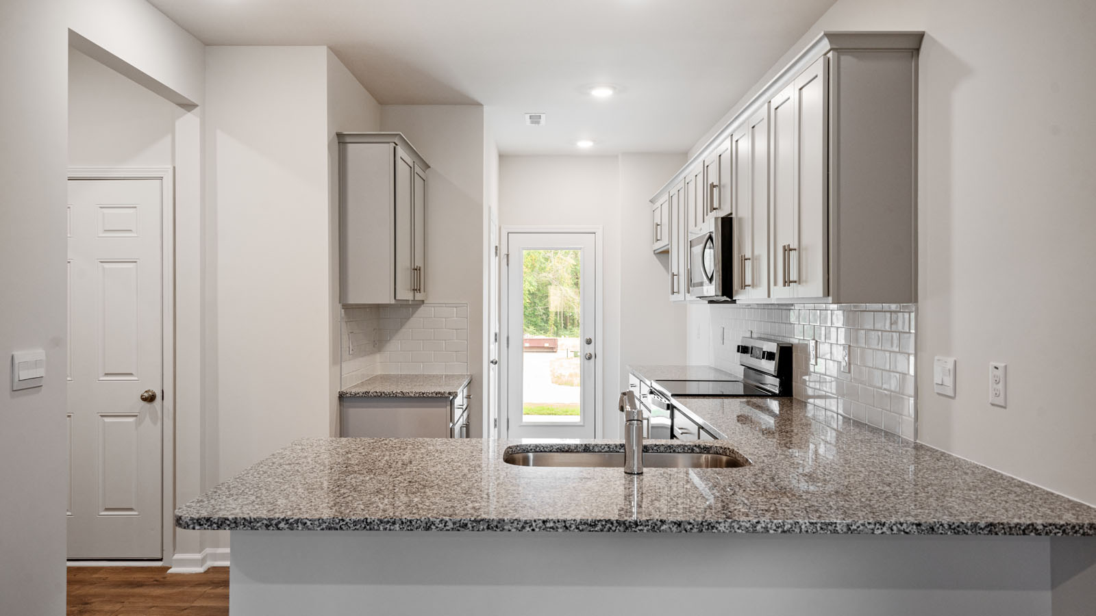 Kitchen with grey cabinets