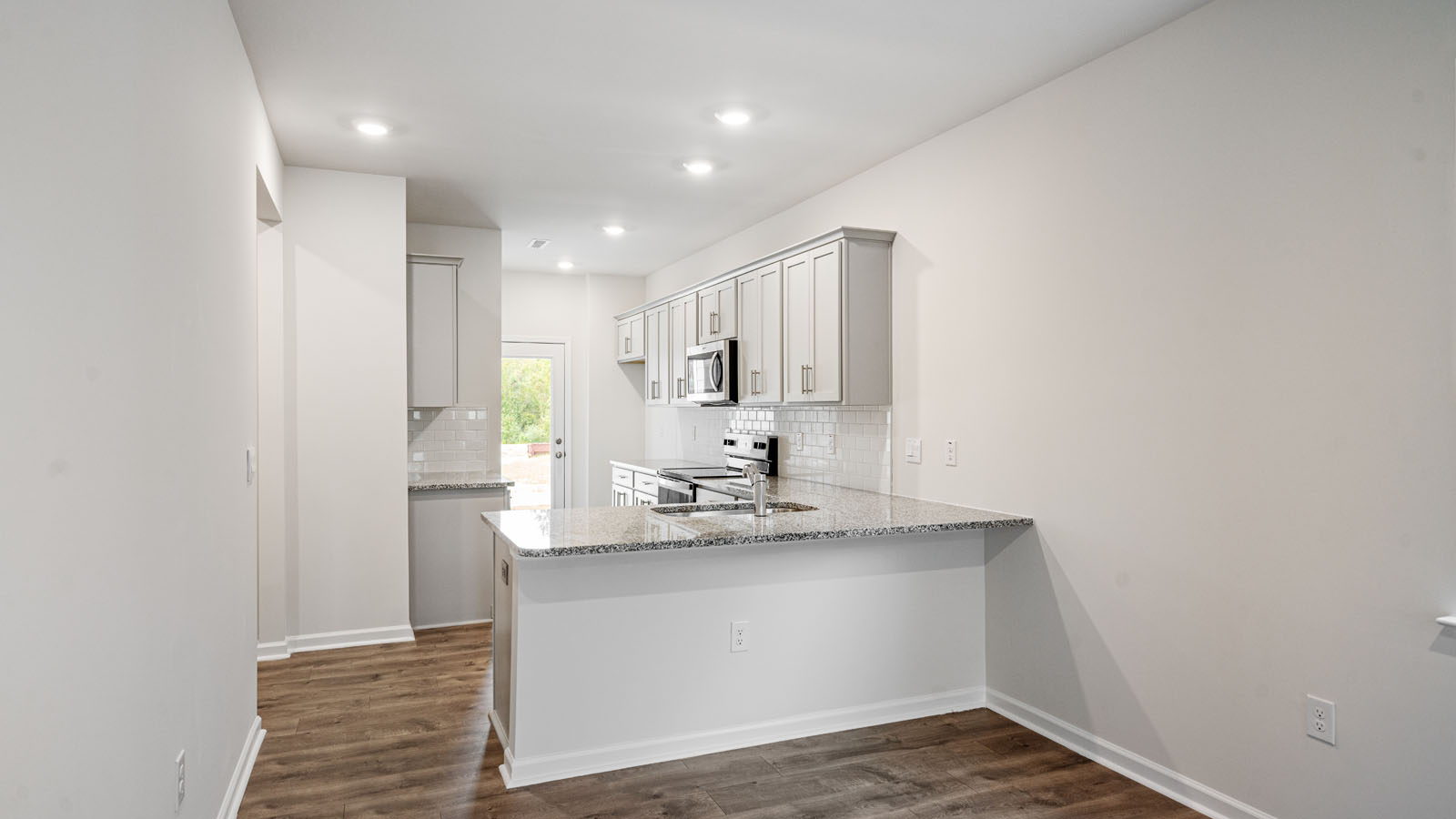 Kitchen with grey cabinets
