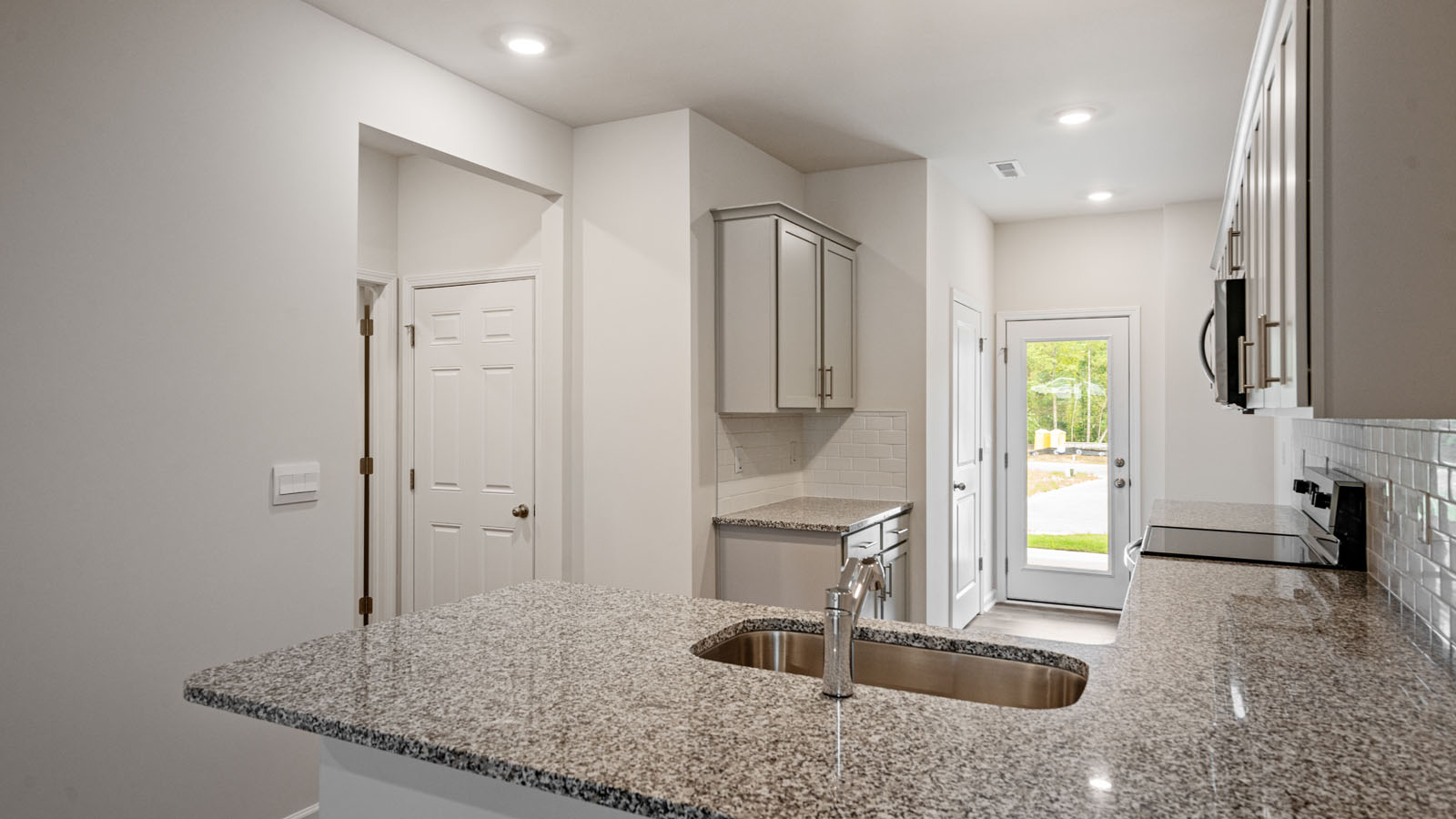 Kitchen with grey cabinets