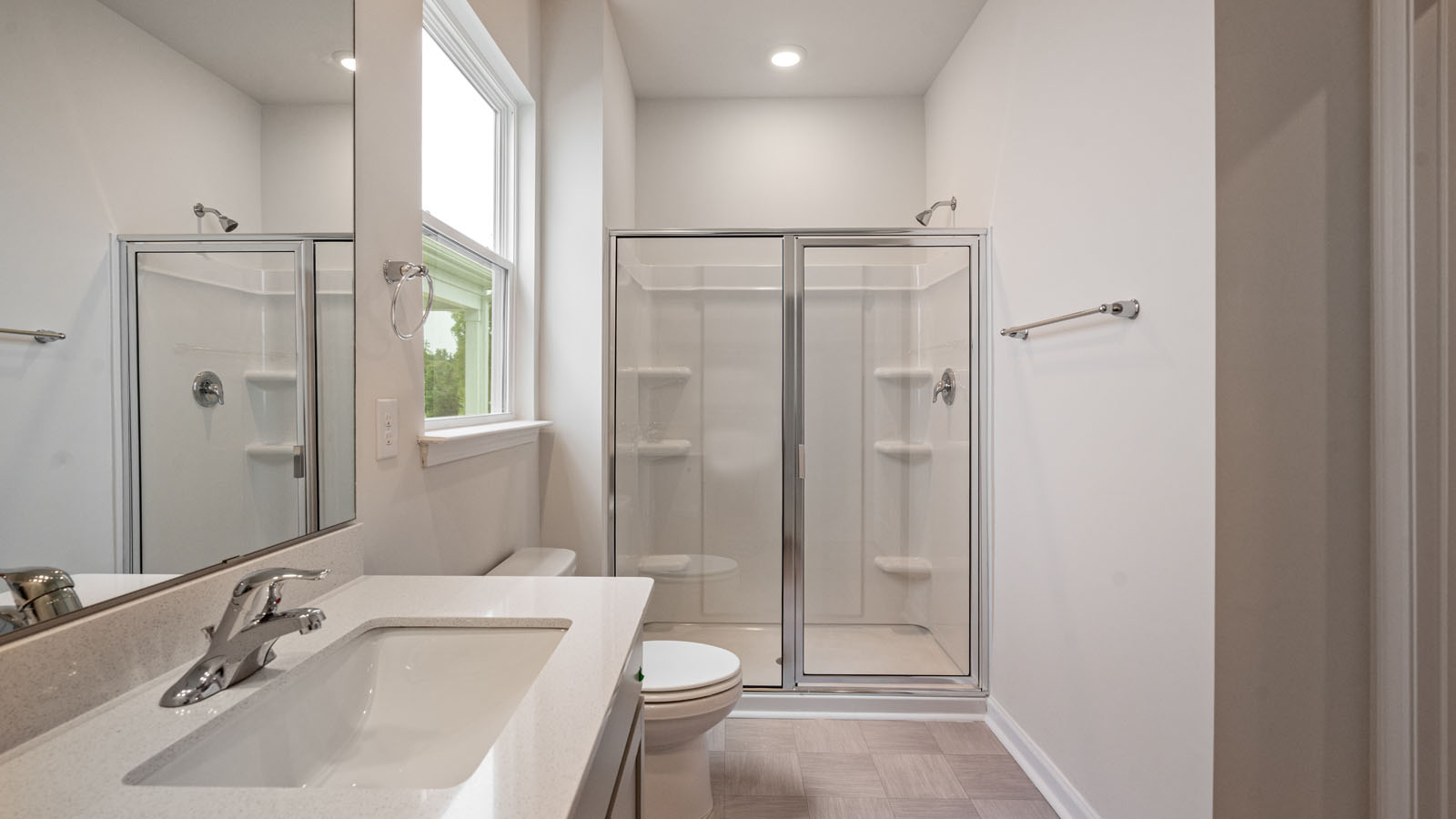 Bathroom with grey cabinets