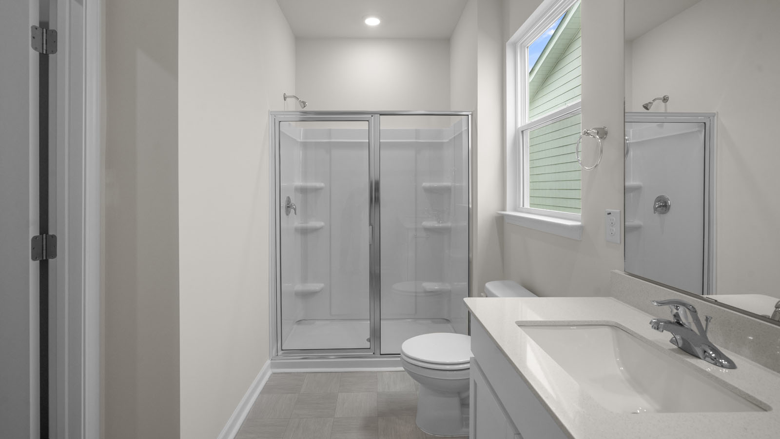 Bathroom with white cabinets