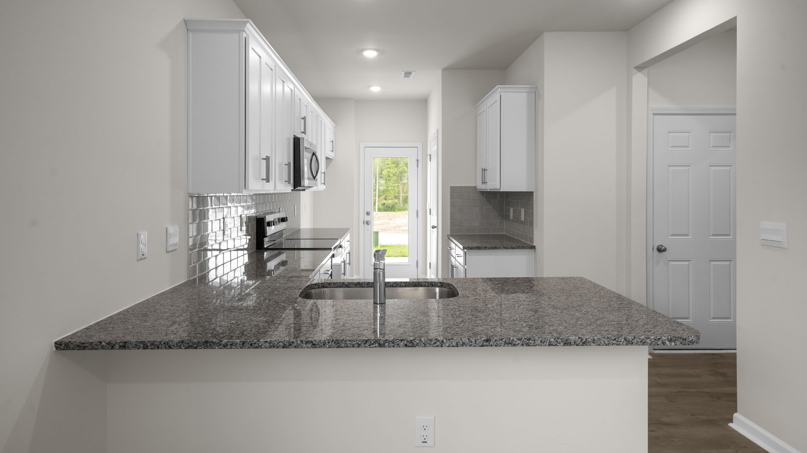 Kitchen with white cabinets