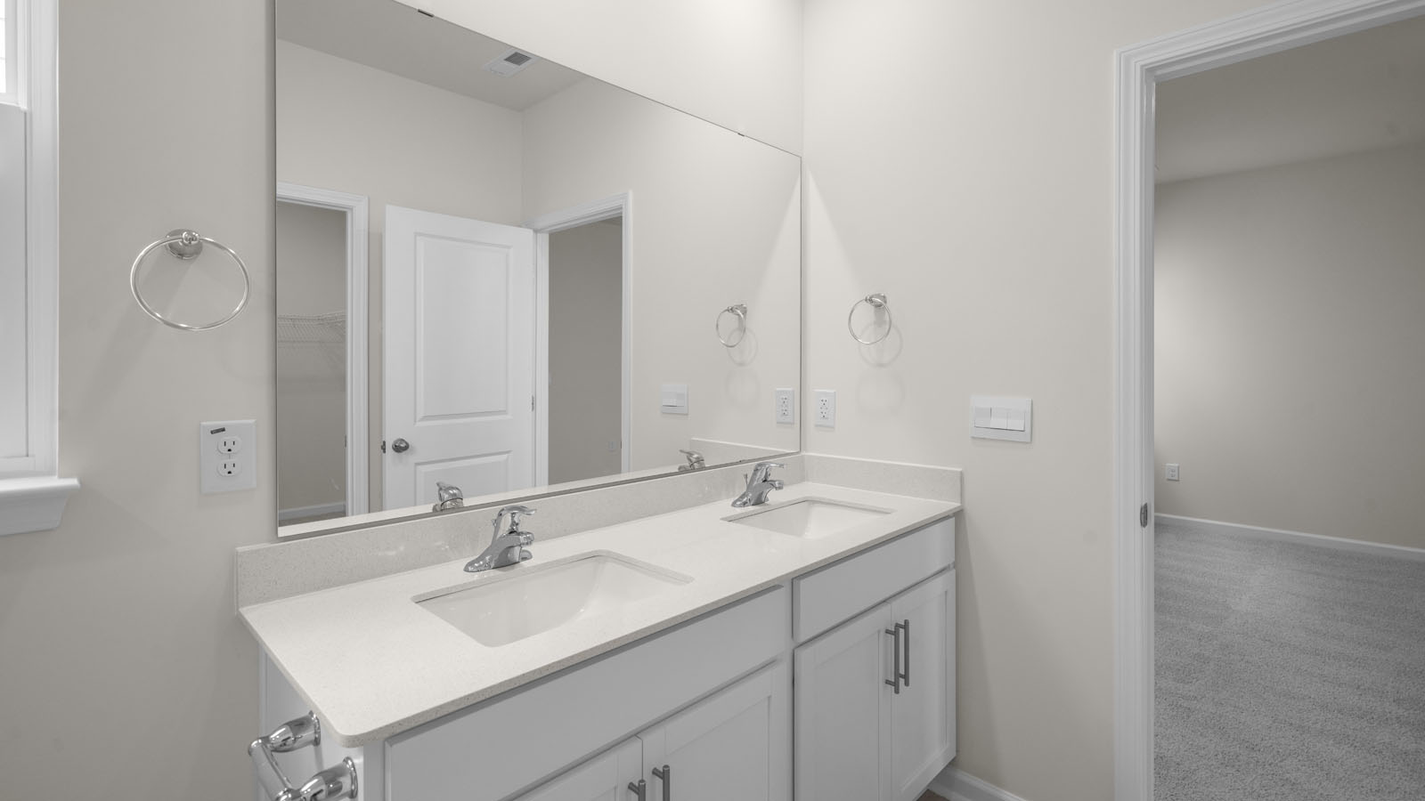 Bathroom with white cabinets