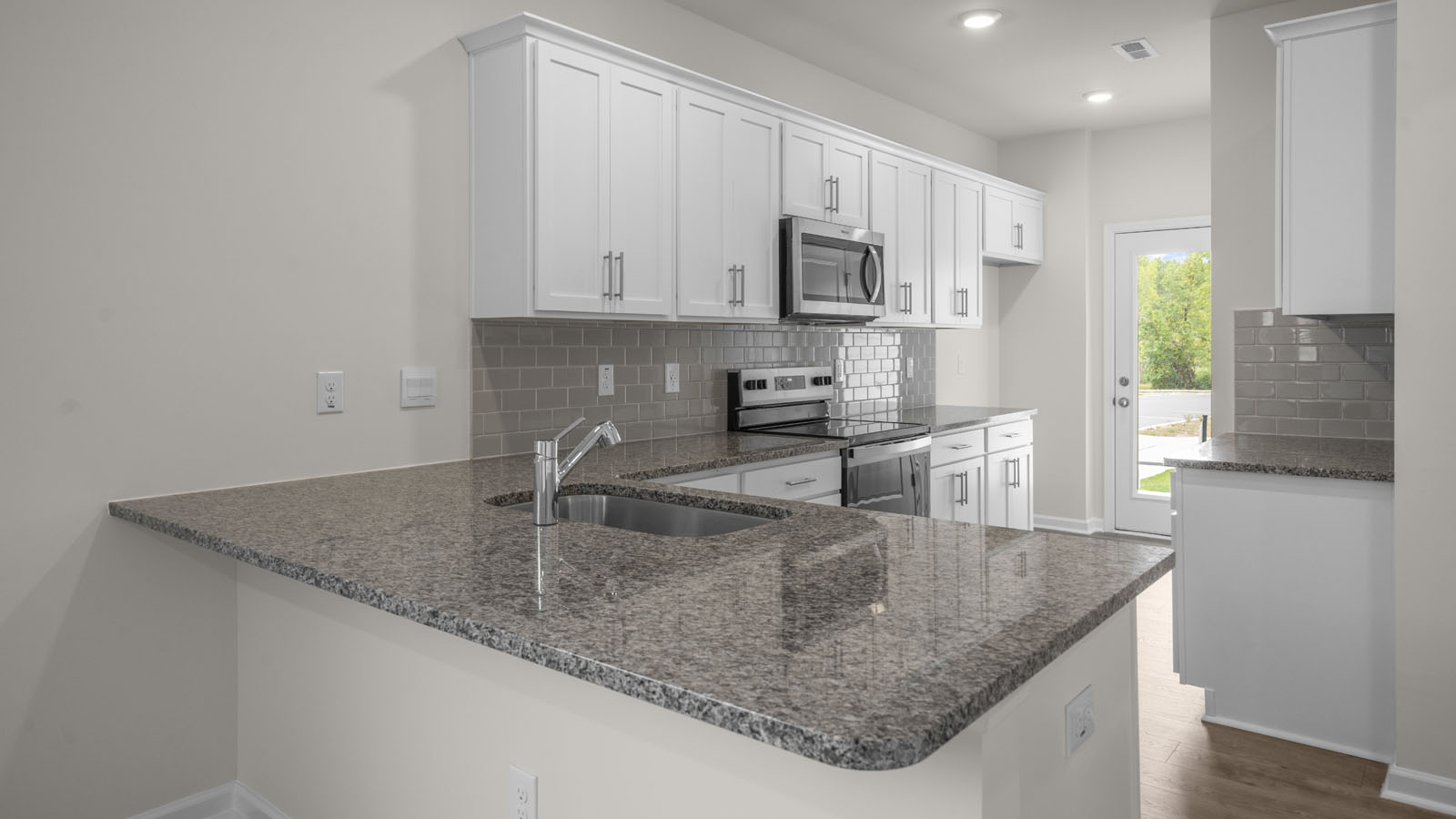 Kitchen with white cabinets