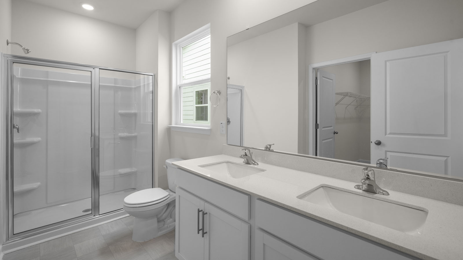 Bathroom with white cabinets
