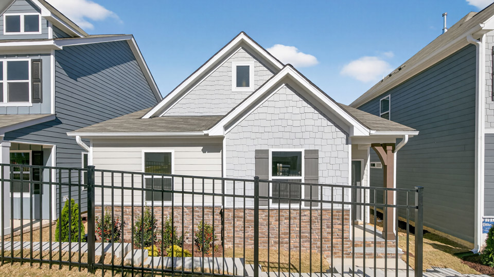 Single story home with blue siding