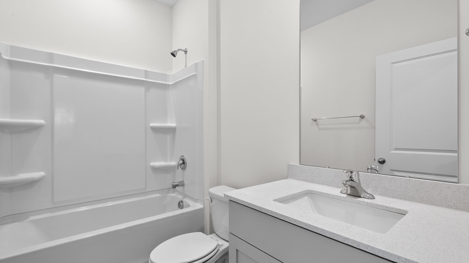 Bathroom with single sink and tub