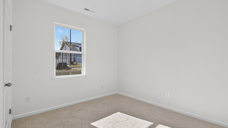 Bedroom with carpet floor and closet