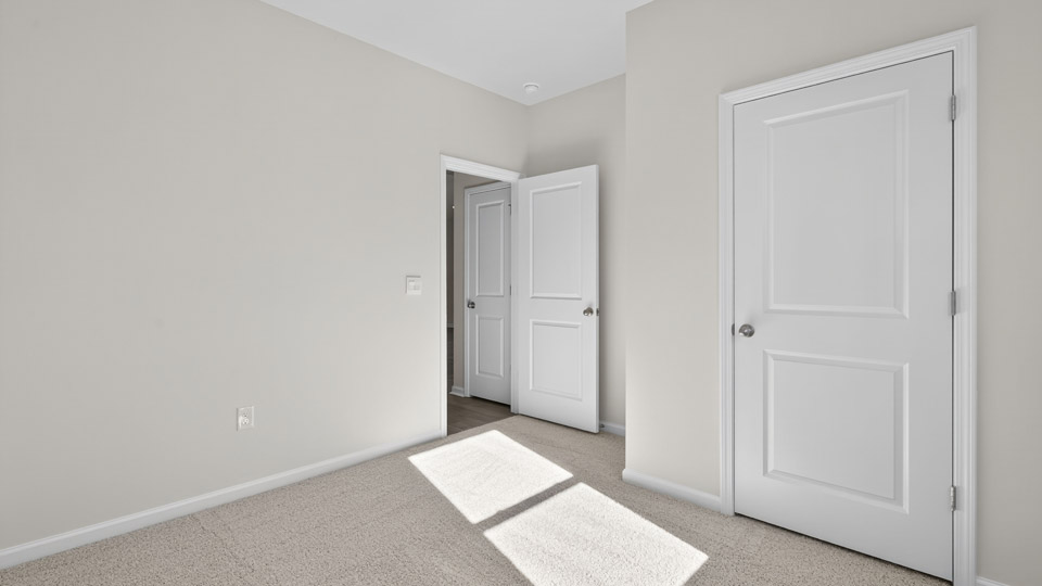 Bedroom with carpet floor and closet