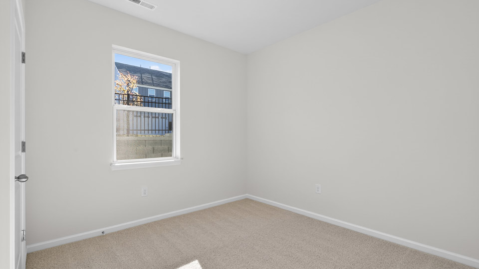 Bedroom with carpet floor and closet