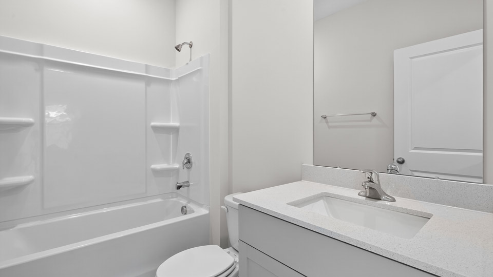 Bathroom with single sink and tub