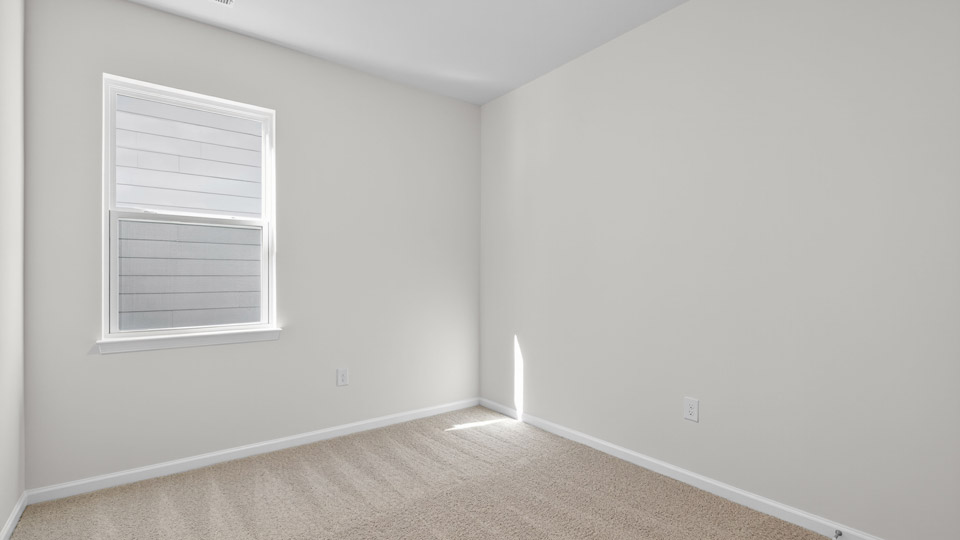 Bedroom with carpet floor and closet