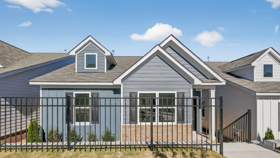 Single story home with blue siding