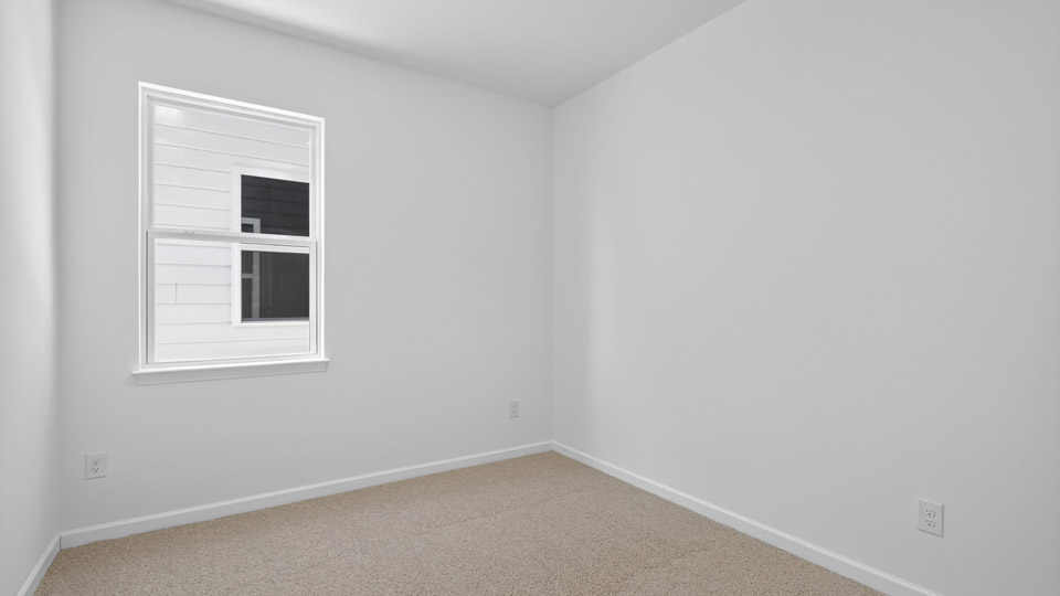 Bedroom with carpet floor and closet