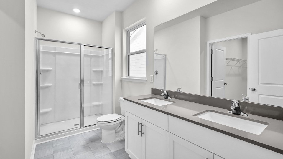 Bathroom with white cabinets