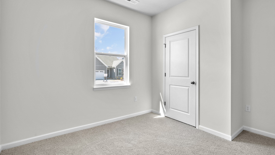 Bedroom with carpet
