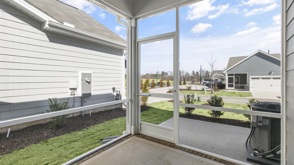 exterior patio with concrete slab and open yard