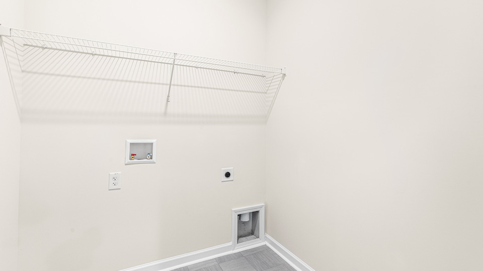 laundry room with wire shelving