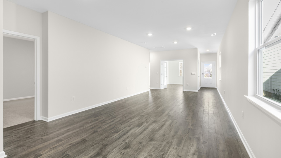 open concept living space with large windows
