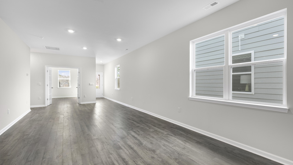 open concept living space with large windows