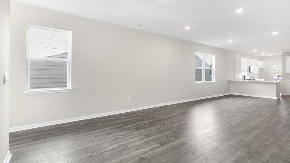 open concept living space with large windows