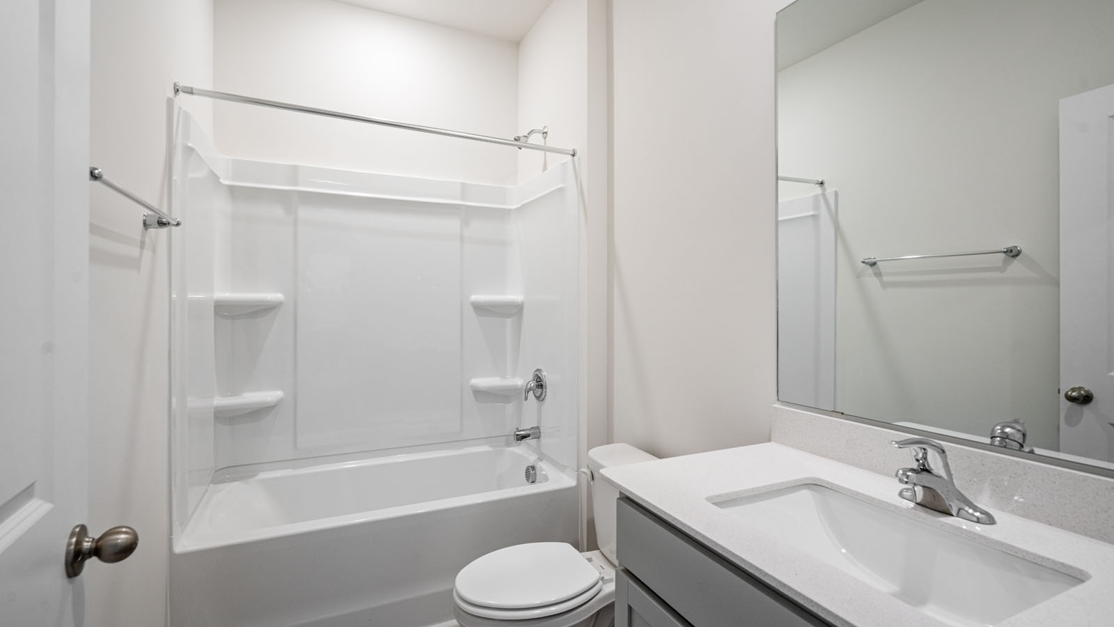 Bathroom with white cabinets