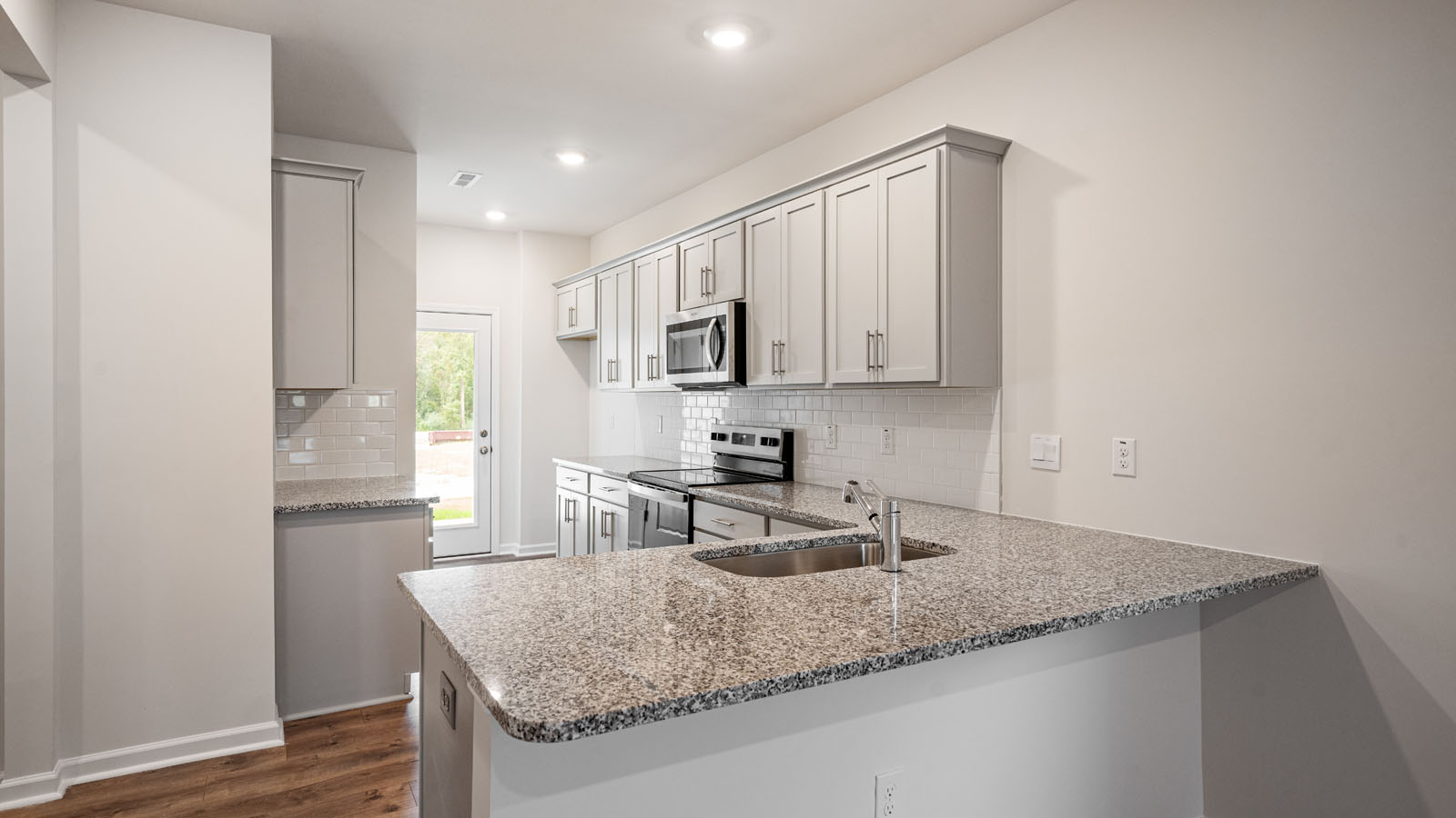 Kitchen with grey cabinets