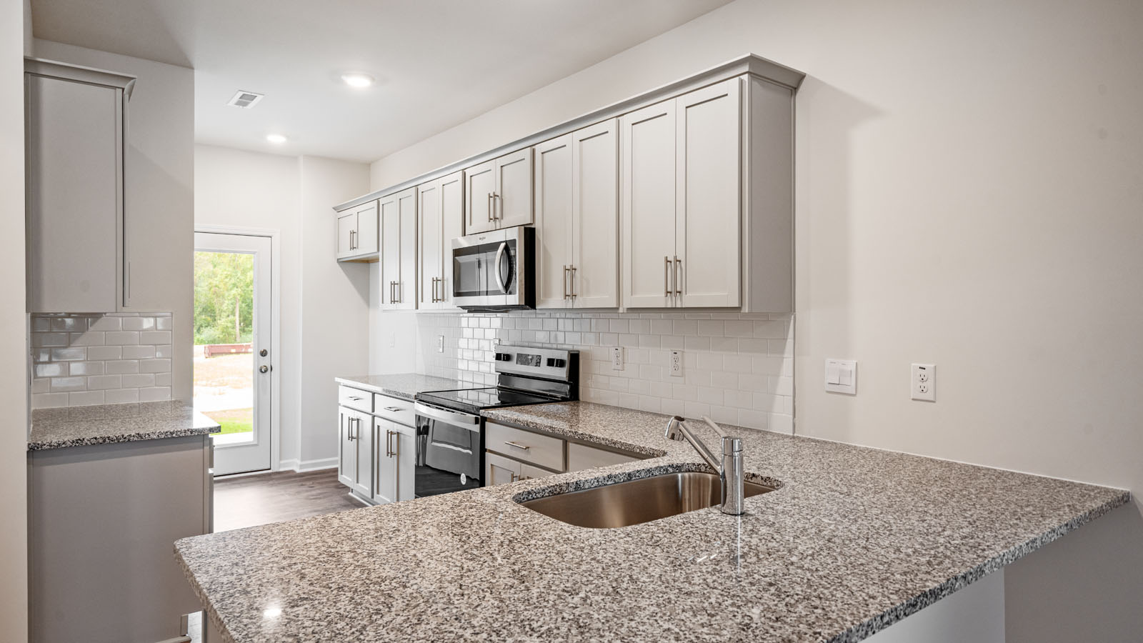 Kitchen with grey cabinets