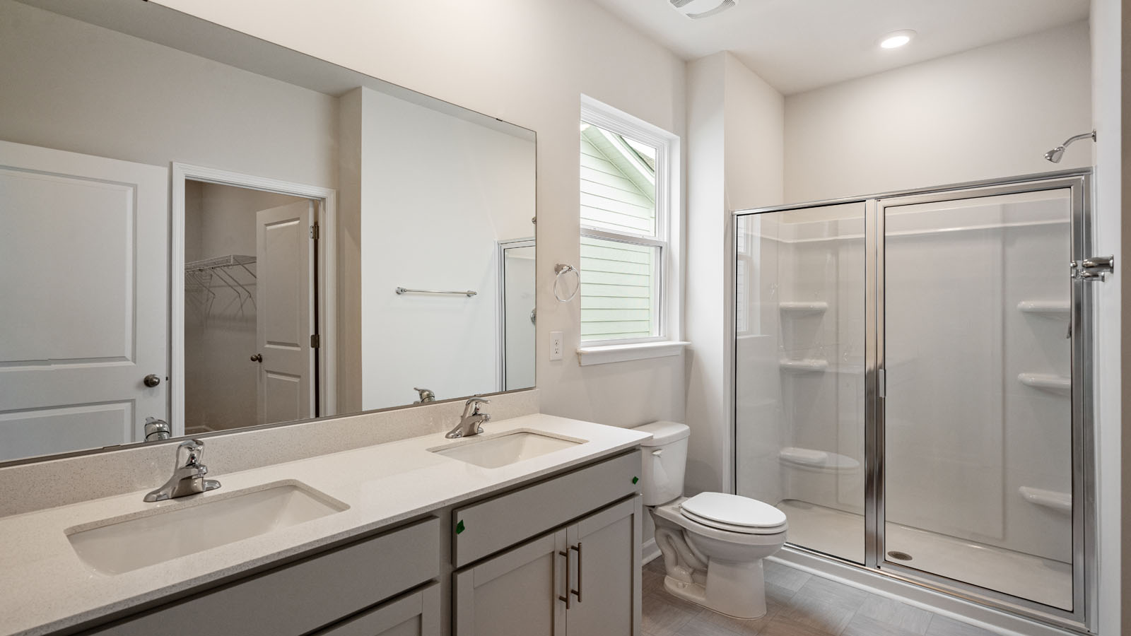 Bathroom with white cabinets