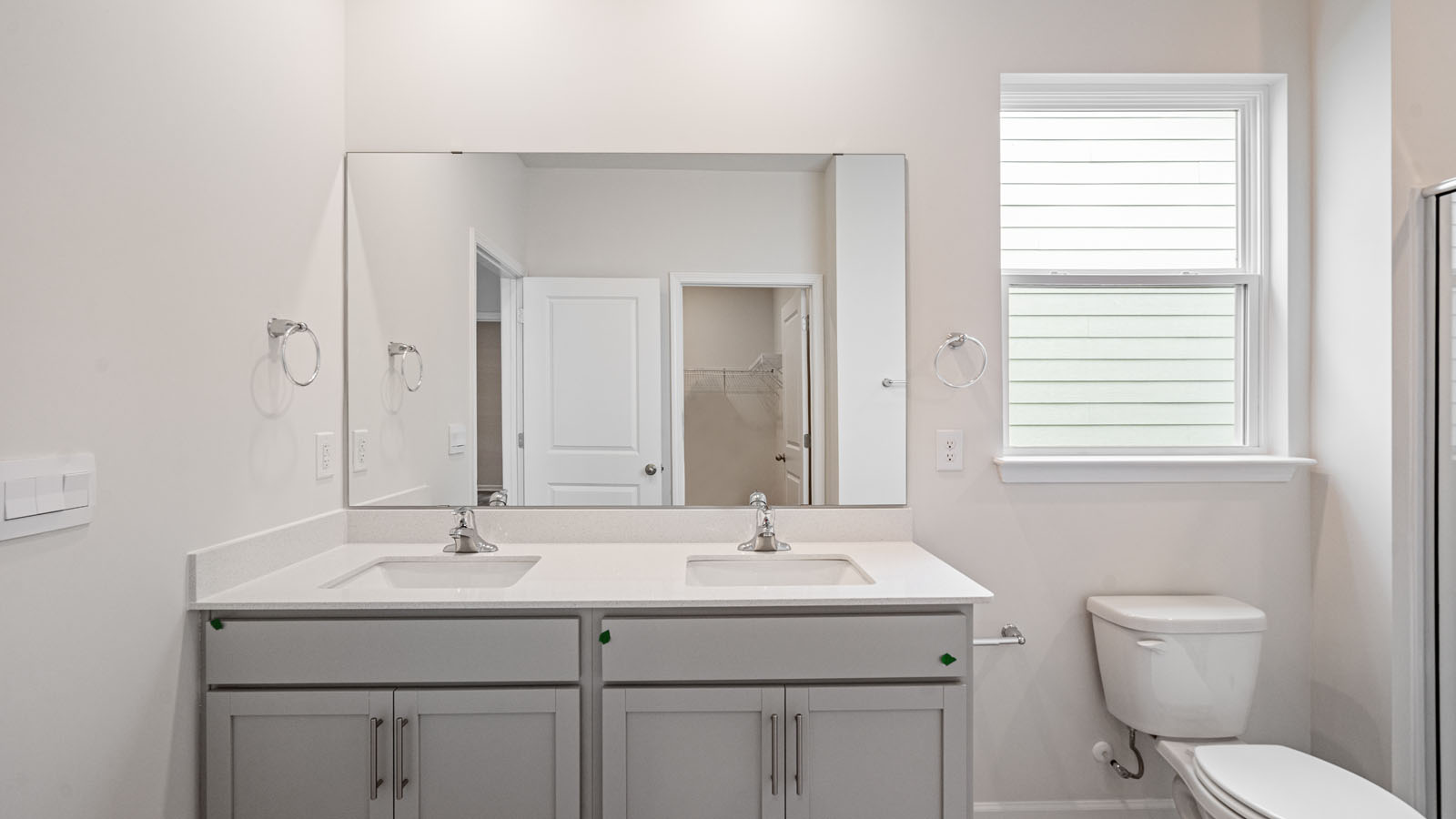 Bathroom with white cabinets