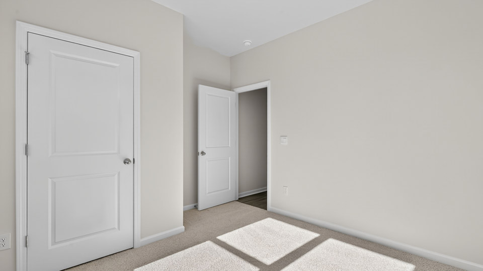 Bedroom with carpet floor and closet