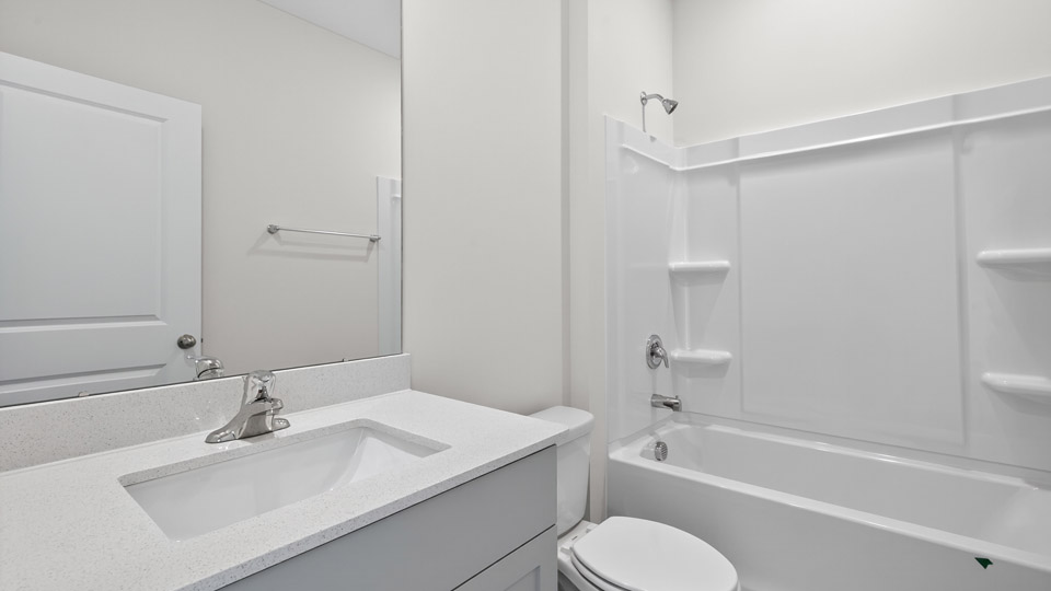 Bathroom with single sink and tub