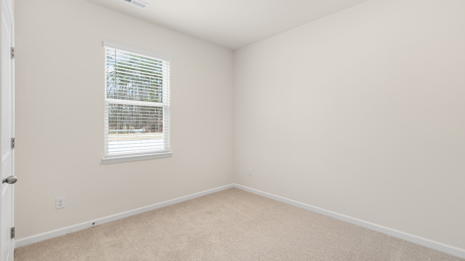 Bedroom with carpet flooring