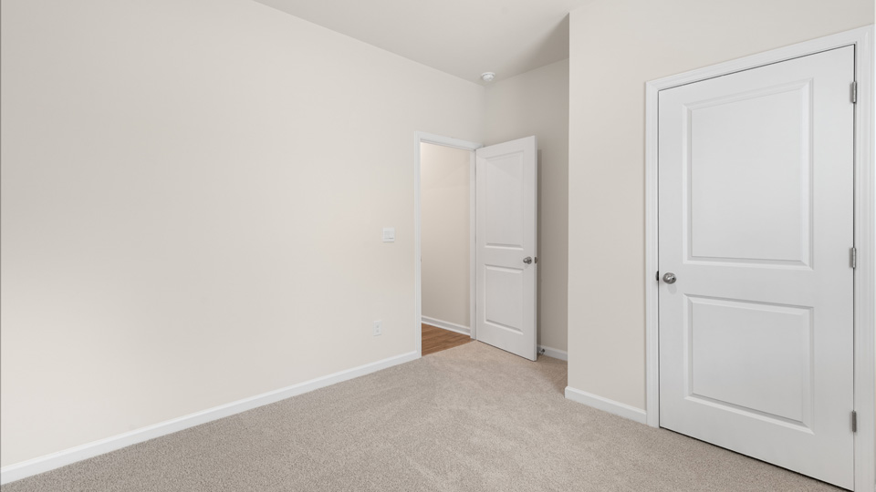 Bedroom with carpet flooring