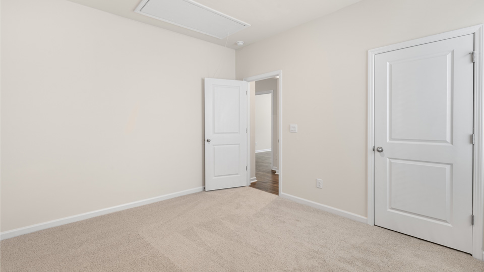 Bedroom with carpet flooring