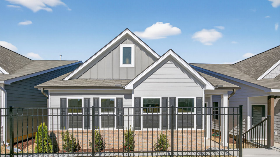 Single story home with blue siding