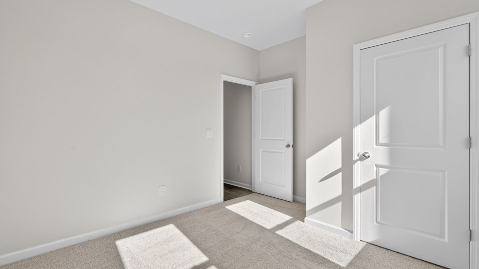 Bedroom with carpet floor and closet
