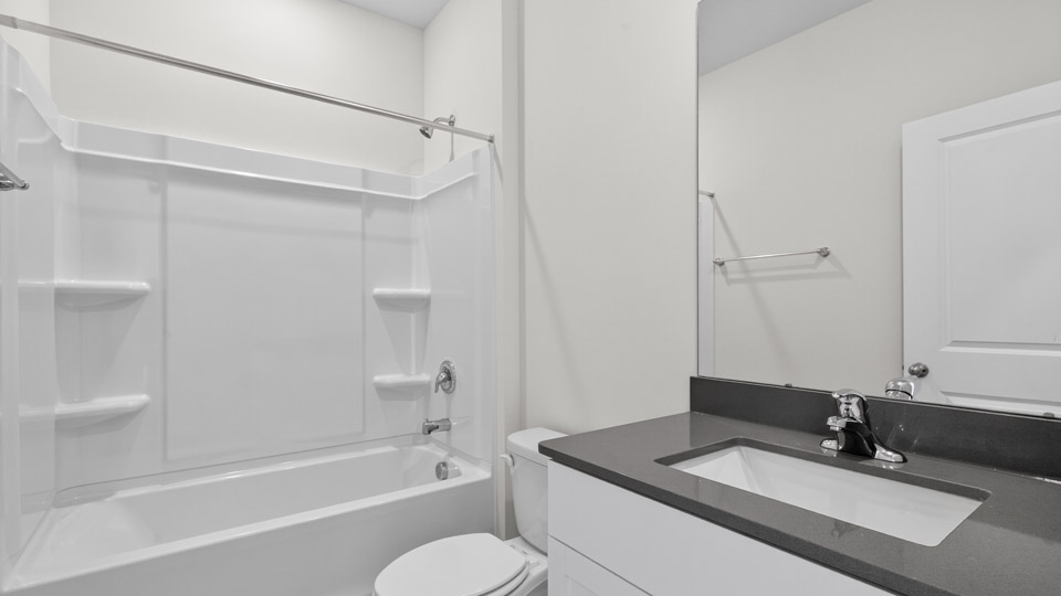 Bathroom with single sink and tub