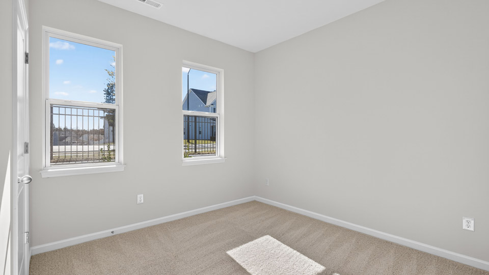 Bedroom with carpet floor and closet