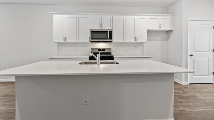 Kitchen with white cabinets