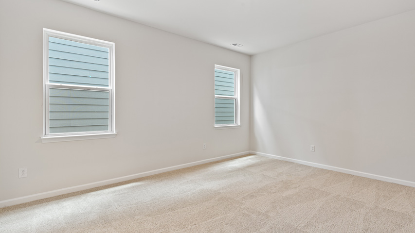 Bedroom with carpet flooring