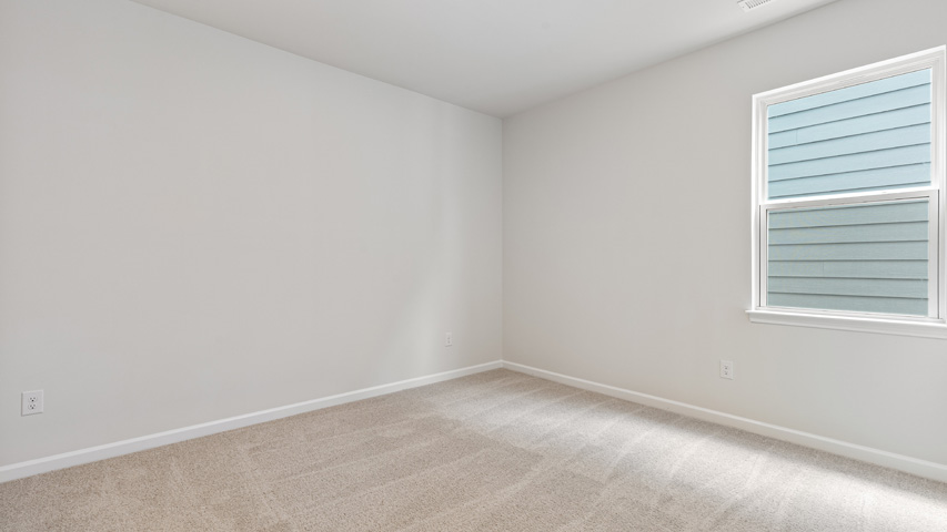 Bedroom with carpet flooring