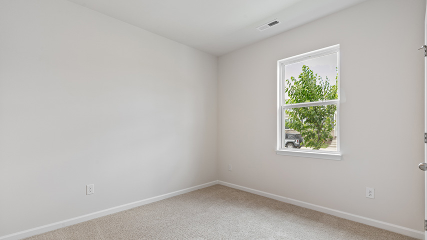 Bedroom with carpet flooring