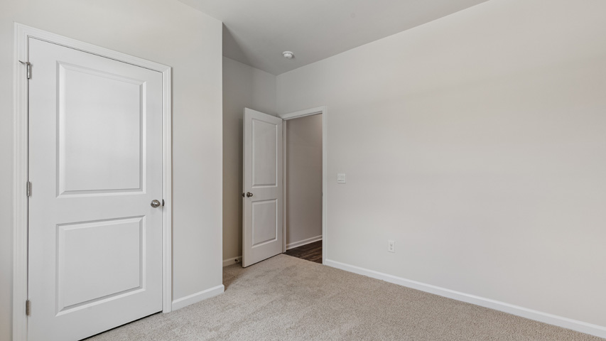 Bedroom with carpet flooring
