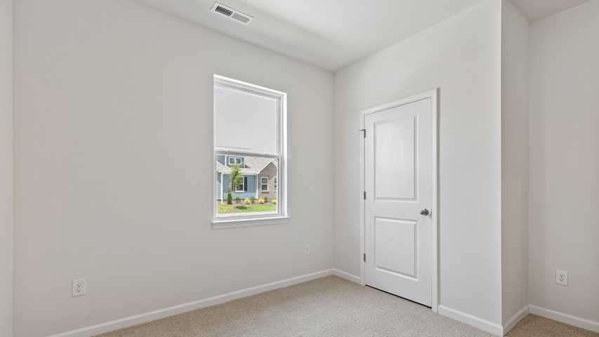 Bedroom with carpet flooring