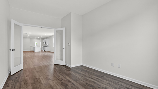 study with revwood flooring and french glass doors
